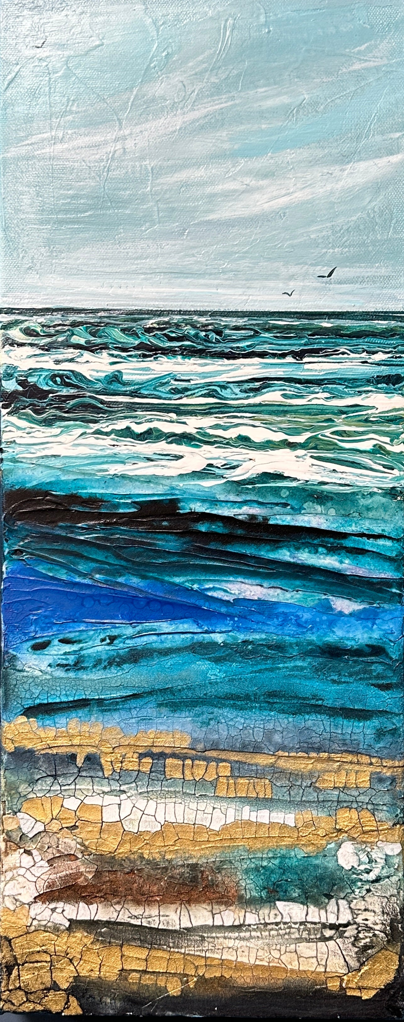 Artistic depiction of a layered ocean scene with blue, gold, and white colors. Seacape painting